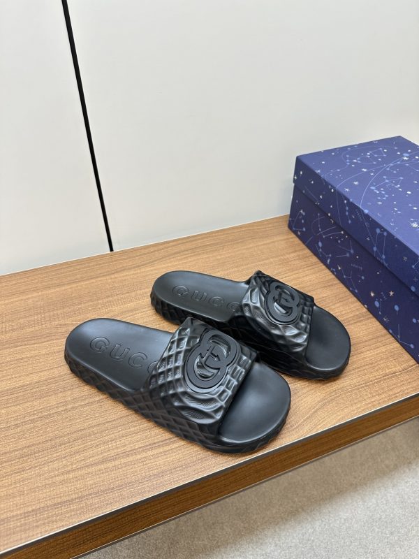 Gucci’s latest couple’s slip-flops Black A